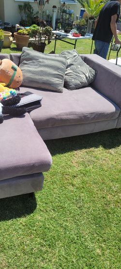 Gray couch with ottoman