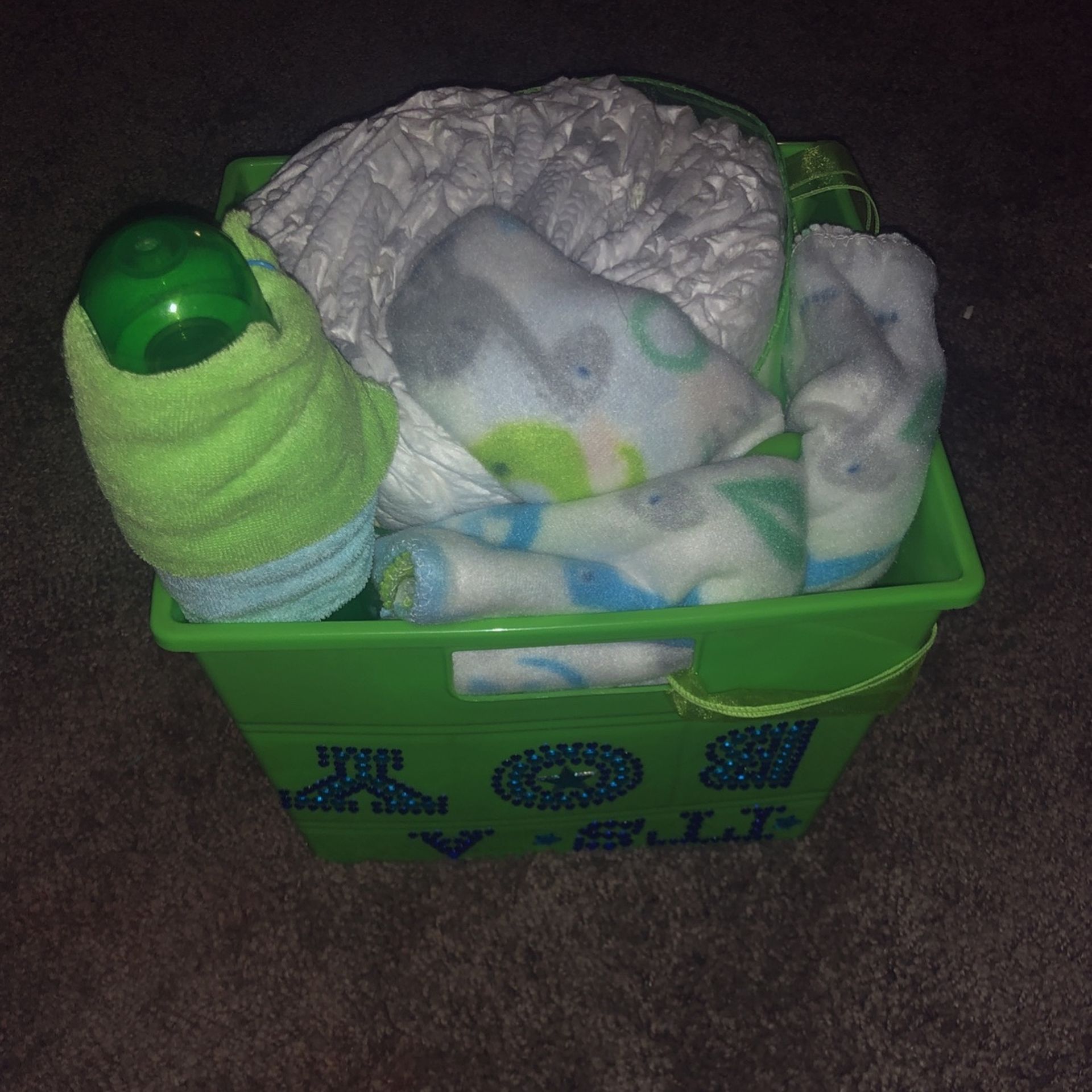 Green Baby Boy Basket With 2 Rolls Of Diapers, 2 Blankets, 2 Wash Clothes, 1 Green Bottle