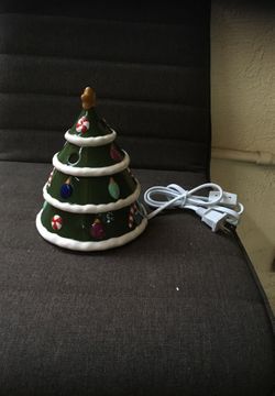 Figura navideńa eléctrica con aromatizador