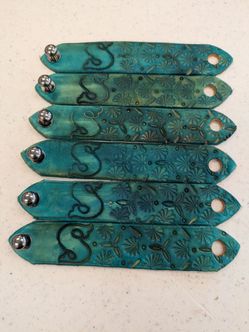 Set of 6 handstamped and dyed leather napkin holder 