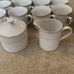 Coffee Cup, Saucers, Sugar Bowl And Creamer