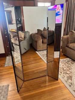 Glassless folding mirror