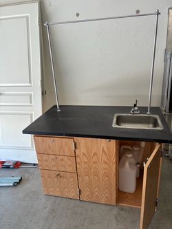 Mobile cart with pump sink