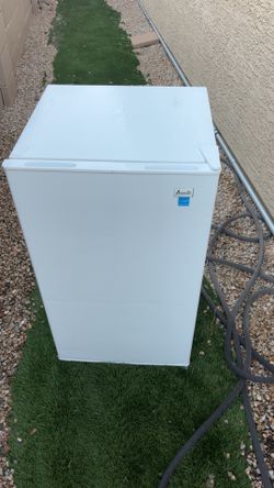 White mini fridge with freezer