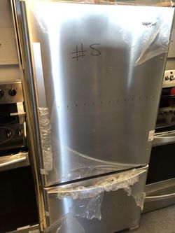New scratch and dent whirlpool 18 cu ft stainless steel fridge with bottom freezer. 1 year warranty