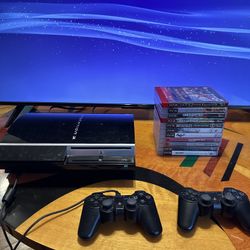 PS3 w/ 11 Games + 2 Controllers