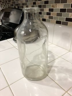 Old milk 1/2 gallon glass jars