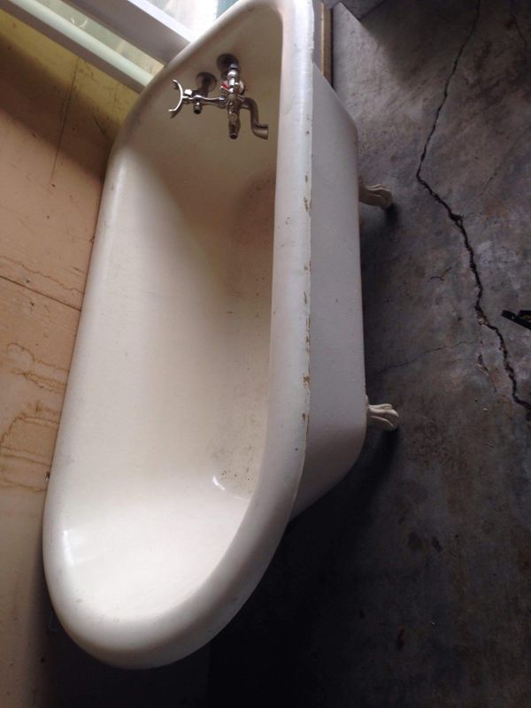 Old school bath tub with stainless fittings for Sale in Sumner, WA