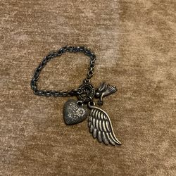 Antique Gold Charm Bracelet With Angel Wing, Wing And Heart Charms 