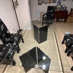 Glass dining room table with cover for glass. 6 super comfortable chairs. $250 