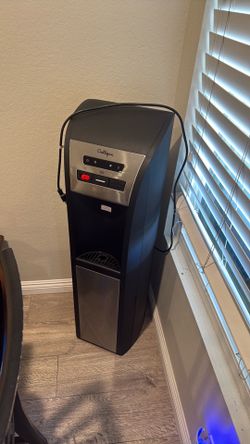 Culligan water dispenser and bottles