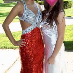 Red sequin gown with cut outs and train