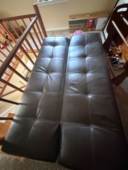 Brown leather futon