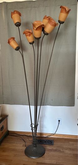 Tiffany Pond Lily Floor Lamp featuring.  multi-stem wrought ironwork and amber art glass shades