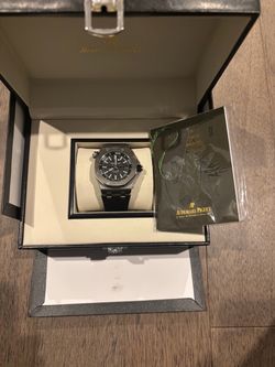Black and silver Audemars Piguet watch
