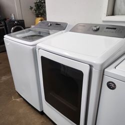 SAMSUNG SET STEAM WASHER AND GAS DRYER 