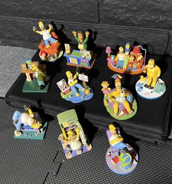 Simpsons Lot comics dvds plush sculptures poster