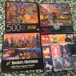 Lot Of 4 Jigsaw Puzzles 10.00