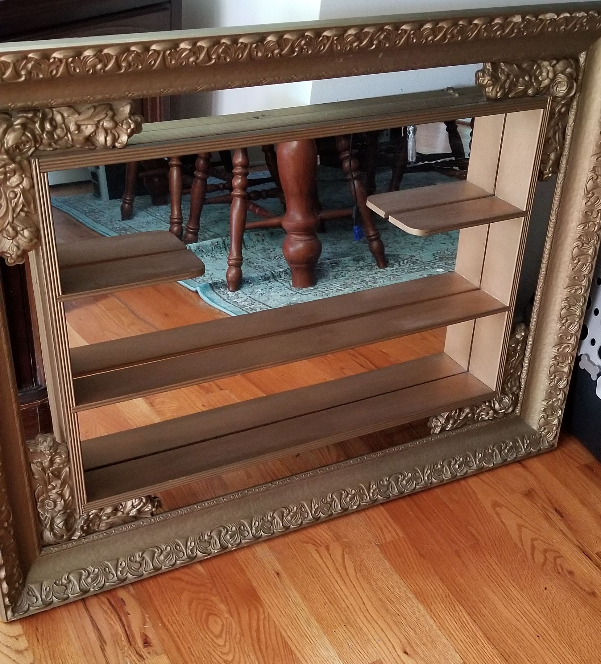 Framed antique mirror hanging