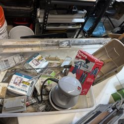 Box of random items electrical parts, mini propane heater, random hand tools