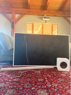 Samsung The Frame TV with Soundbar, Subwoofer, and Apple TV
