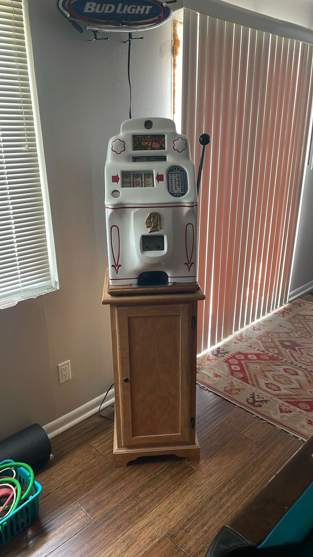Slot machine with cabinet.