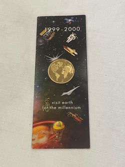 1(contact info removed) Millennium commemorative gold-plated medallion.