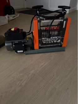 Electric wire stripper
