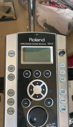 Roland TD-9 electric drum set.