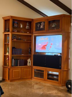 Custom wall unit including 50” LG-TV with stand. $1200.