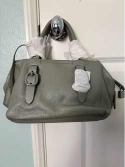 New DKNY green pebbled satchel featuring a structured top handle
