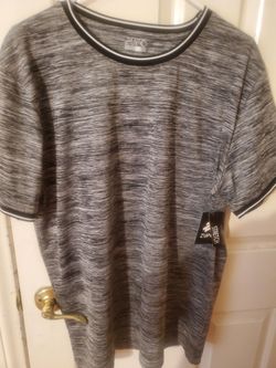 Brand new Men's dress shirt size lg made by Zupo tag still on