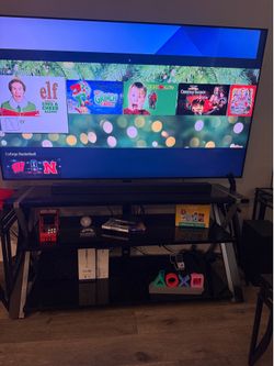 65’ Sam sung smart TV & sound bar with sub. TV stand.  55’ Sam sung smart TV