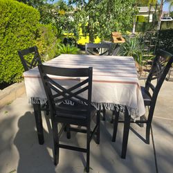 High dinner table with 4 chairs