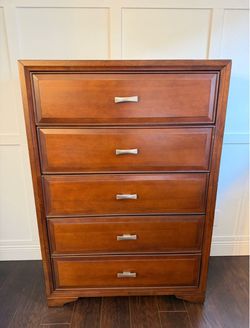 Wooden drawer chest (rooms to go)