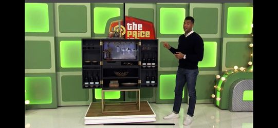 Wine bar cabinet ! Brand new… Won on the Price is Right!