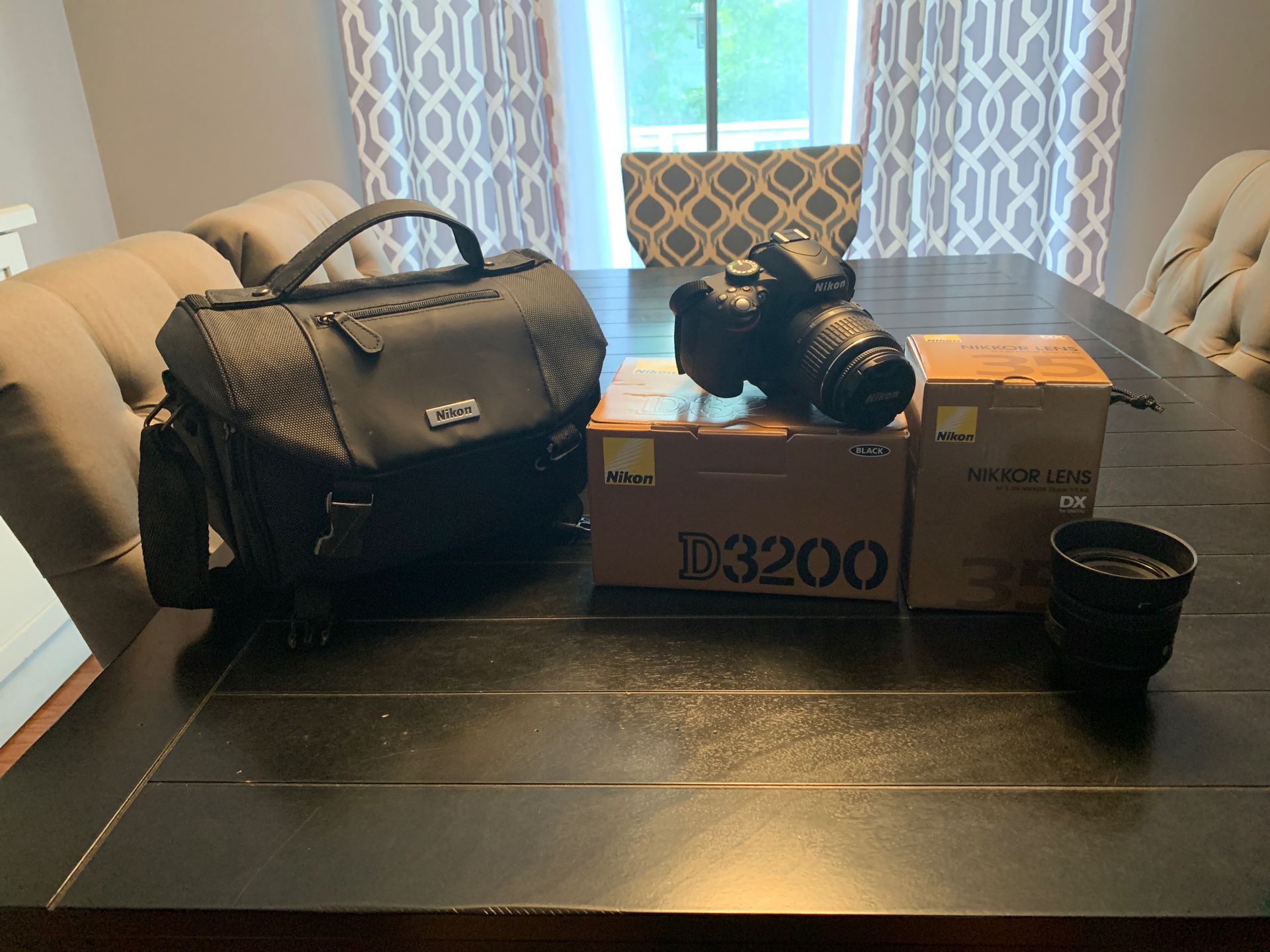 Nikon D3200 with two lenses, bag, charger excellent condition
