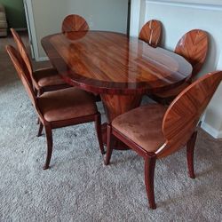 PENDING. Expanding Dining room table with 6 chairs +. 