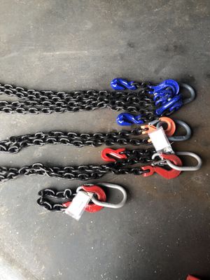 Photo 1/2” Lifting chains .one 3’ foot, two 8 foot, One two part 12 ‘