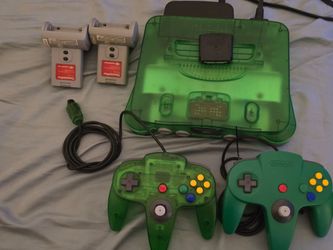 Nintendo 64 jungle green console with games