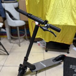 QINGOR FOLDABLE ELECTRIC SCOOTER 350W POWER-SPEED 19MPH-RANGE 25MILES-10IN. SOLID TIRES FRINT SUSPENSION. BLUETOTH 