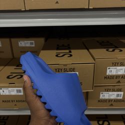 Blue Yeezy slides