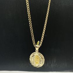 14k solid Gold Cubana chain and  Virgin Mary Charm
