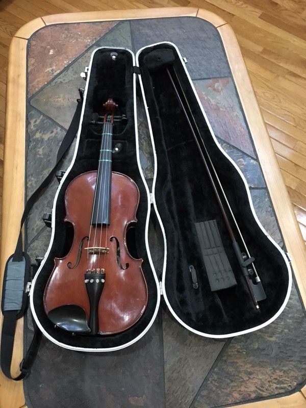 14” viola with bow and case. Copy of Antonia Stradivarius. Gently used