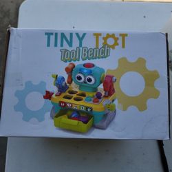 Play and learn tiny tot to a bench.