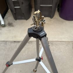 Husky tripod pulsating sprinkler works good adjustable tripod 
