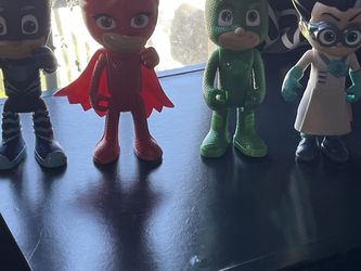 PJ Masks, Cat boy, Owlet, Geko, And Romeo. They Are Size Of A Hand And They All Talk.