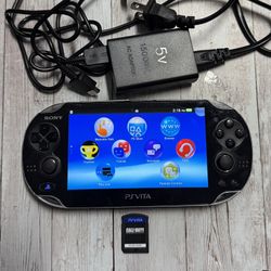 Sony PS Vita Console With Charger And Game Call Of Duty 