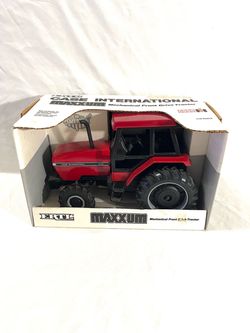 Mint condition still in the box USA made by toy maker ERTL scale 1/16 Diecast Case-IH toy tractor.