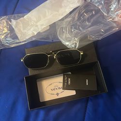 PRADA GLASSES